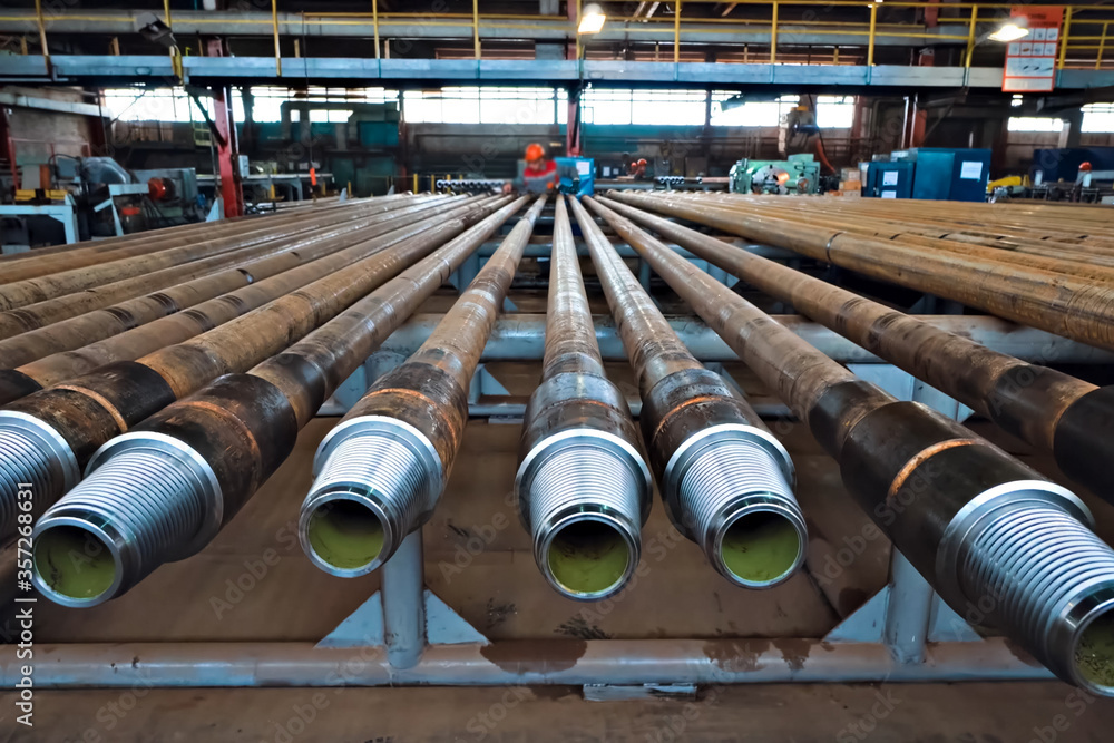 Pumped compressor pipes for oil well. Oil and gas equipment. Stock ...