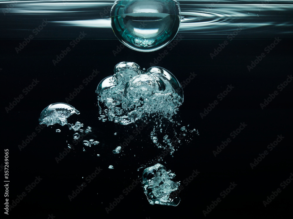 Bubbles floating underwater Bubbles floating underwater