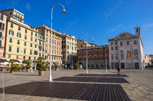 Genoa, Italy - August 18, 2019: The Palazzo San Giorgio or Palace of St. George in Piazza Caricamento of Genoa, near the Porto Antico di Genova photo