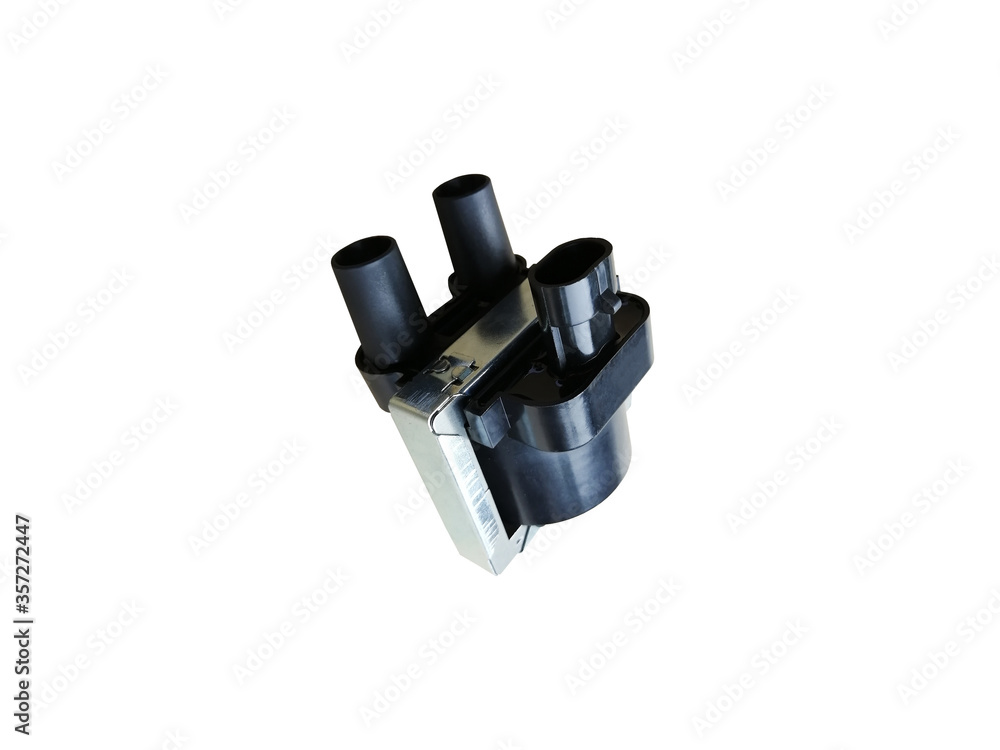 New car ignition coil on an isolated white background. Component of the ignition system. Spare parts. New car ignition coil on an isolated white background. Component of the ignition system. Spare parts.