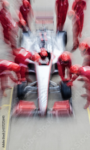 Obraz na płótnie Racing team working at pit stop