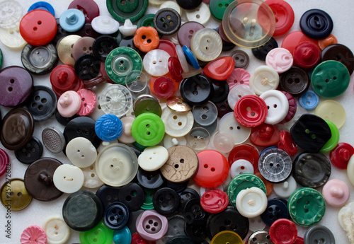 colorful buttons on wooden background