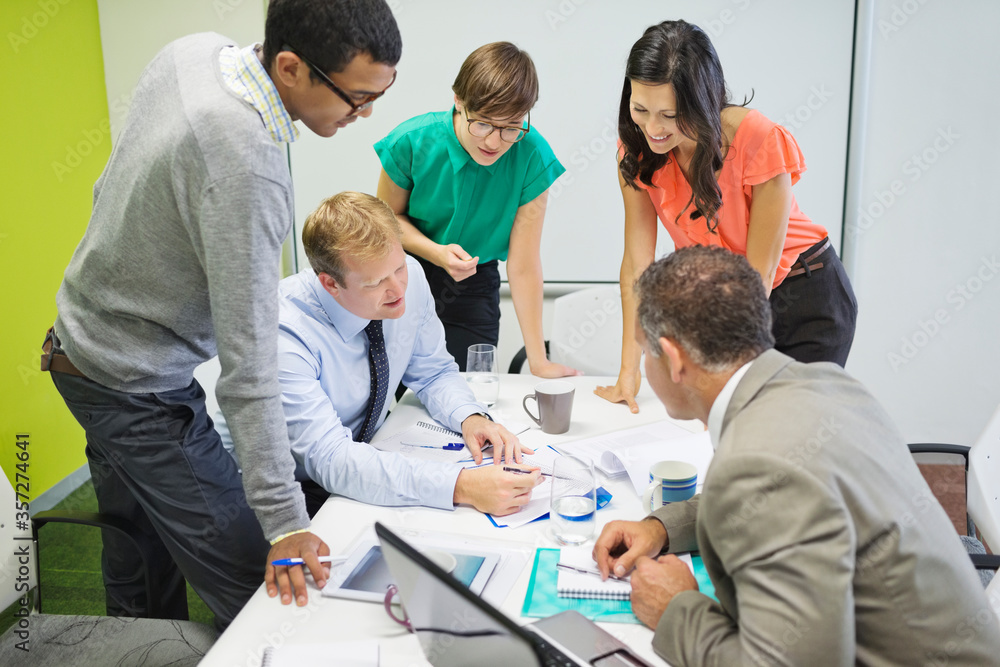 Business people talking in meeting Business people talking in meeting