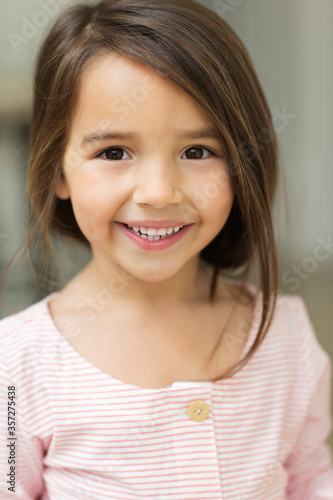 Close up of girl‚Äôs smiling face