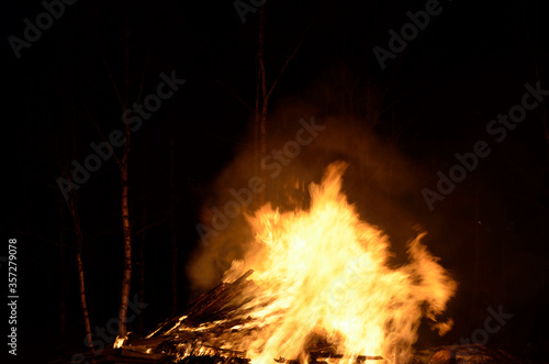 massive wood fire in winter night
