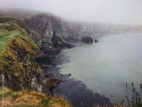 Cliff in a foggy day