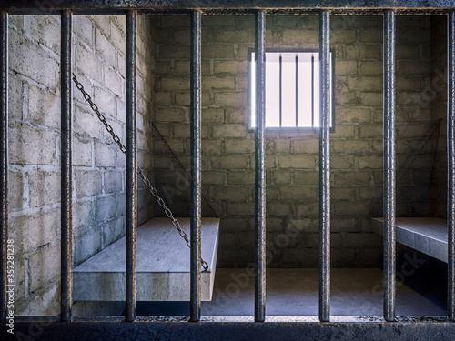 View of the prison cell through bars with sun shining through the window, 3d Render, 3d Illustration