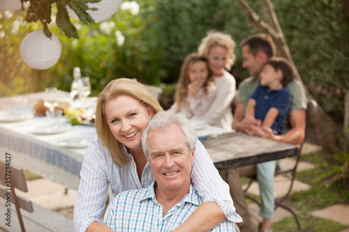 Portrait of smiling senior couple at family picnic © Lee Edwards/KOTO