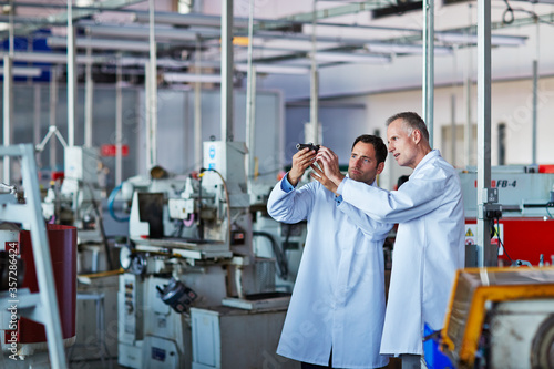 Photography Scientists working in laboratory