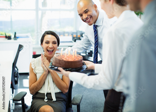 Photography Business people celebrating birthday in office