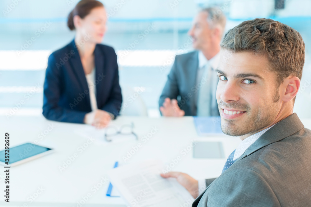 Portrait of confident businessman in conference room Portrait of confident businessman in conference room