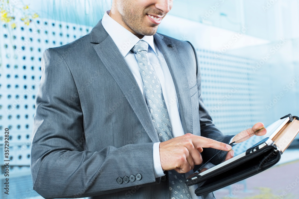 Businessman using digital tablet Businessman using digital tablet