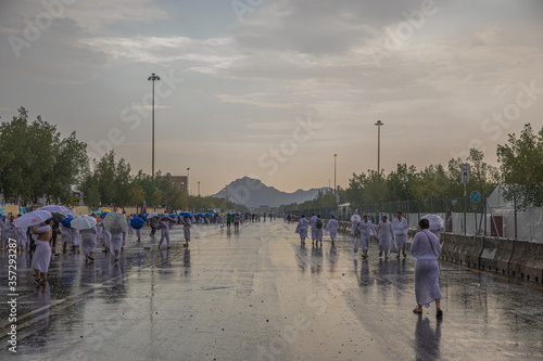 rainy day in Arafat,Hajj, Pilgrims performing Hajj, Islam, Makkah, Saudi Arabia, August 2019 photo