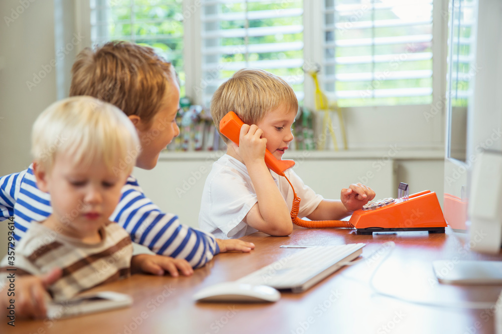 Children working in home office Children working in home office