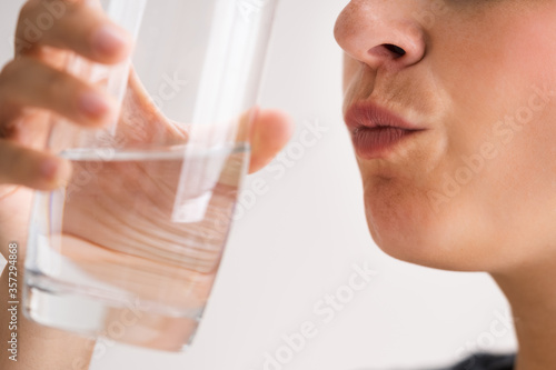 Mouth Rinse And Gargle Using Antiseptic Mouthwash
