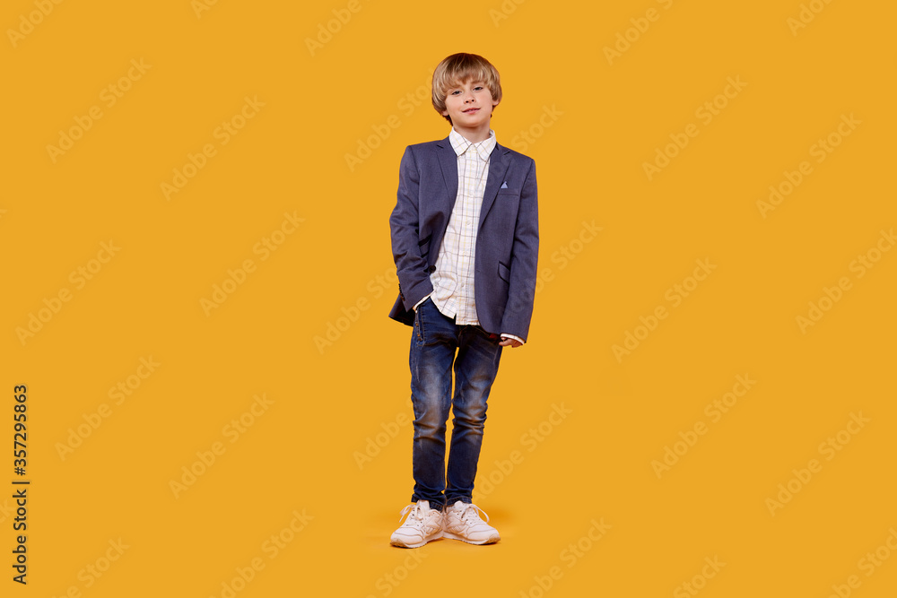 Beautiful boy in business suit and white shirt in full height Beautiful boy in business suit and white shirt in full height