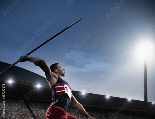 Track and field athlete throwing javelin