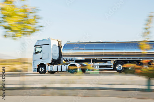 Принти на полотні Stainless steel milk tanker on the road