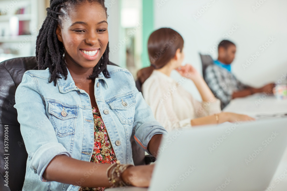 People working at conference table in office People working at conference table in office