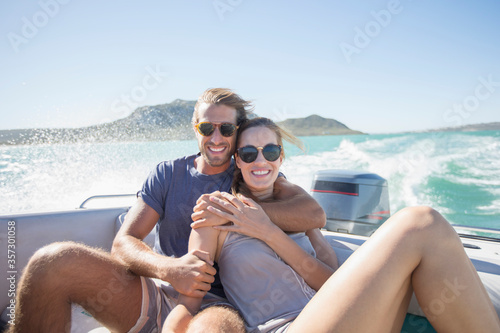 Couple sitting on boat together