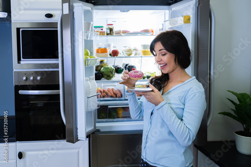 Woman Eating Unhealthy Food
