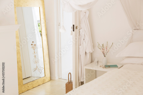 Window  bed  door  and bedside table in modern bedroom