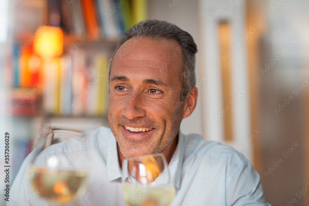 Older man drinking white wine Older man drinking white wine