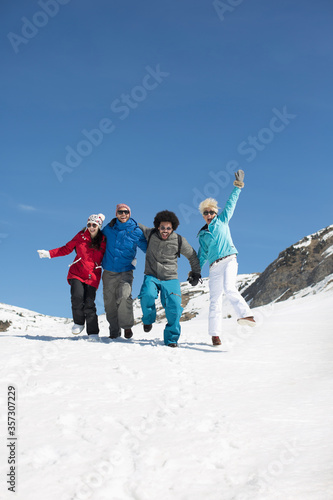 Friends playing in snow