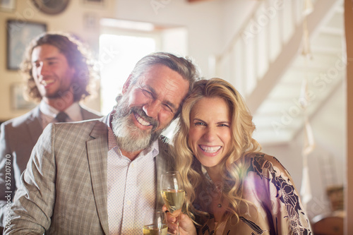 Canvas-taulu Portrait smiling matron of honor best man during wedding reception in domestic r