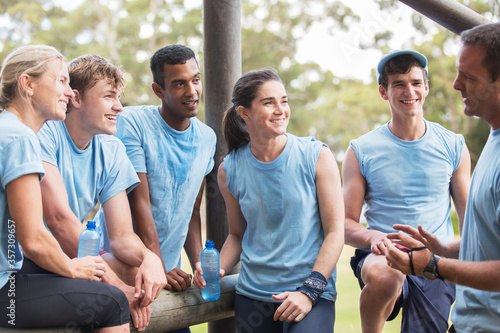 Photography Team leader talking to teammates at boot camp