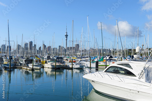 Boats at Westhaven Marina, Auckland New Zealand; View to Auckland City as the Background photo