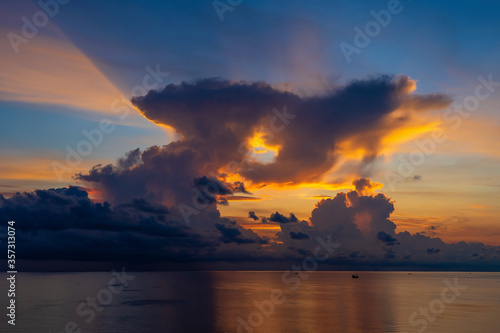 Sunrise on the island of Phu Quoc  Vietnam. Travel and nature concept. Morning sky  clouds  sun and sea water