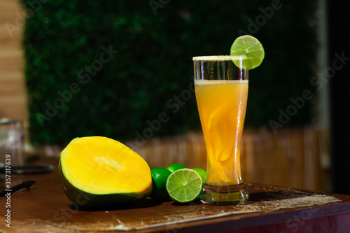 Micheladaof mango, Beer  cocktail of lemon and mango