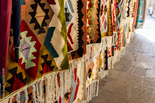 National carpets with Caucasian patterns are for sale in the old town © Gozalov
