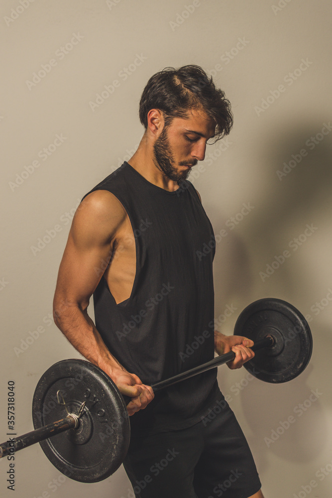 muscular man lifting weights muscular man lifting weights