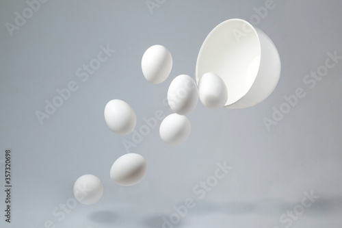 Eggs falling out of a bowl