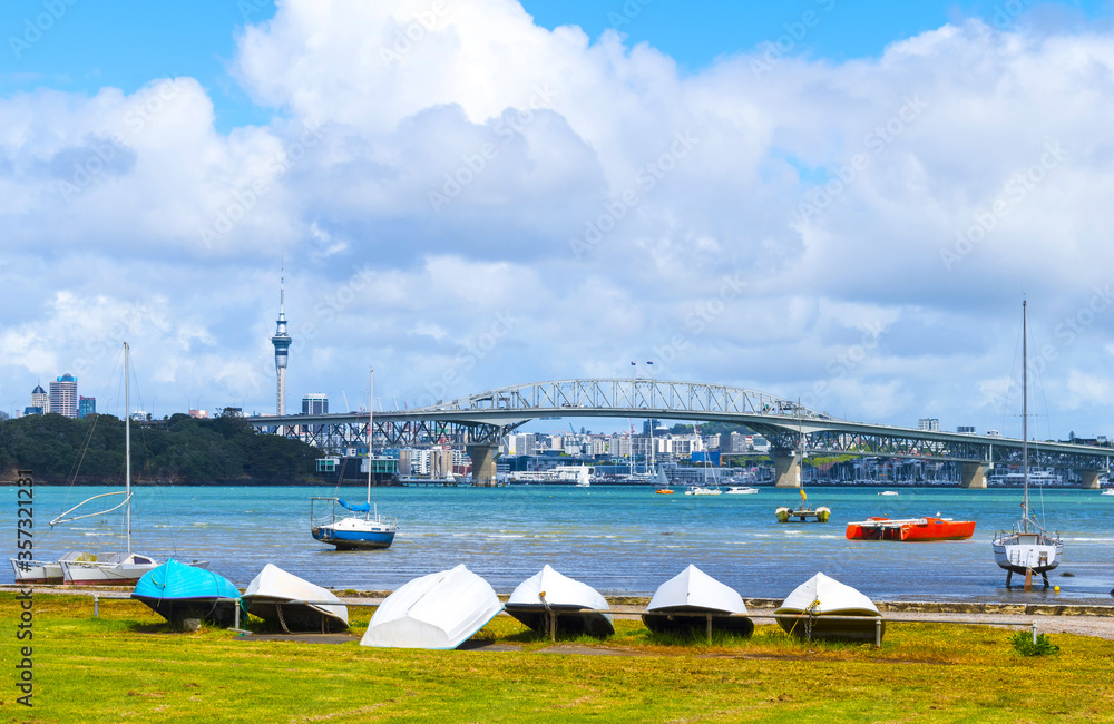 Harbour Bridge and Auckland City Landscape as the Background View from Little Shoal Bay Beach Auckland, New Zealand; During Low Tide Period