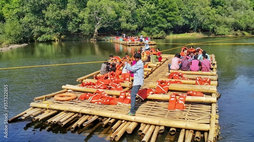 Obraz na płótnie river rafting at kuruwadweep,The rafts are made up of bamboos providing you a th