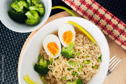 Vegetarian Noodles meatless with green broccoli and egg photo