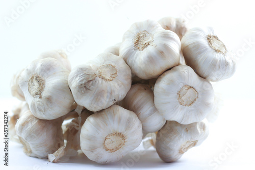 Group of garlic on white background