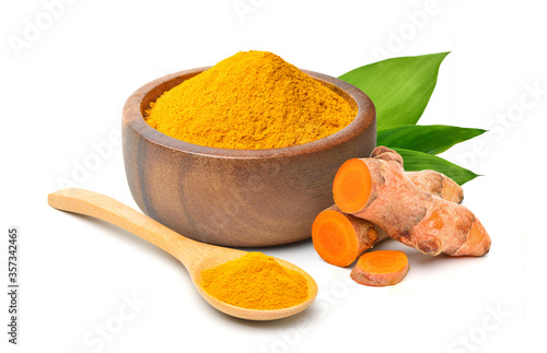 Принти на полотні Finely dry Turmeric (Curcuma longa Linn) powder in wooden bowl with  rhizome (root) sliced and green leaves isolated on white background
