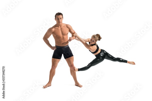 Young couple in sportswear training isolated view