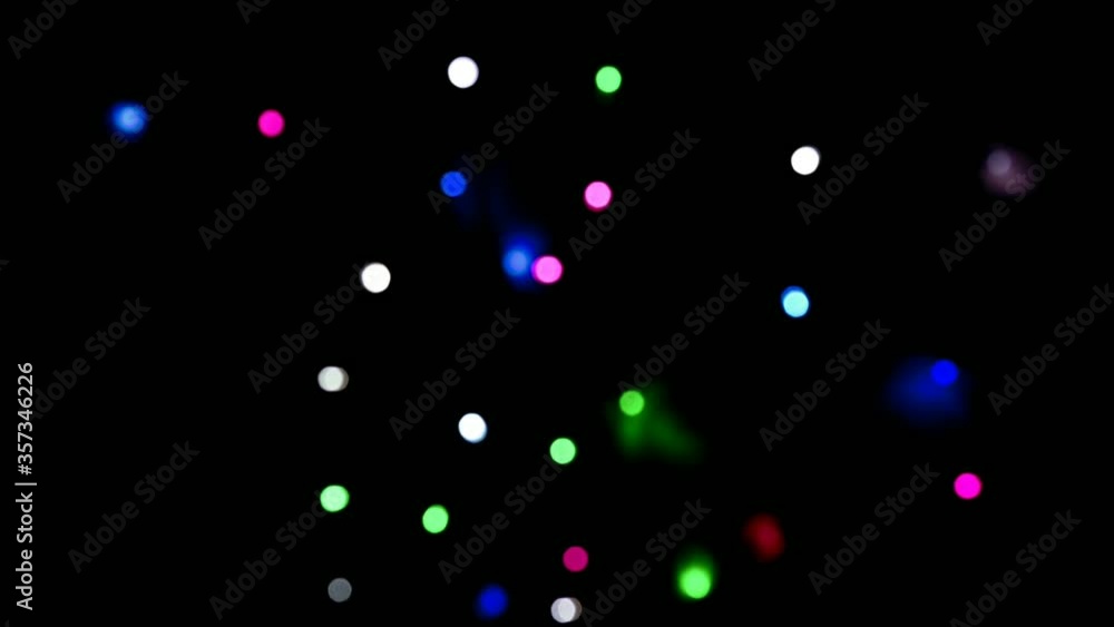 Beautiful glittering bokeh in dark blurry background at night. The round colorful bokeh shine,Blue pink green and purple bokeh ,selective focus without noise, Shot with real lens and then colored, Beautiful glittering bokeh in dark blurry background at night. The round colorful bokeh shine,Blue pink green and purple bokeh ,selective focus without noise, Shot with real lens and then colored,