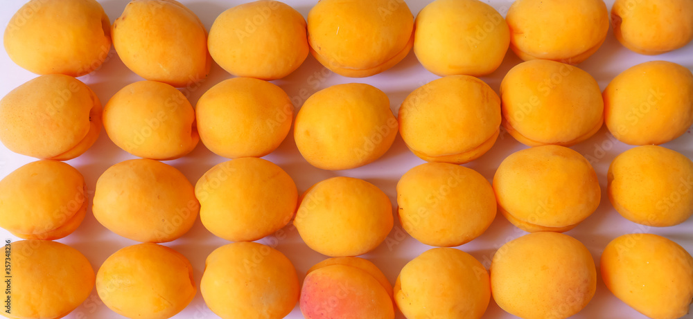 Flat Lay of delicious ripe yellow apricots Flat Lay of delicious ripe yellow apricots