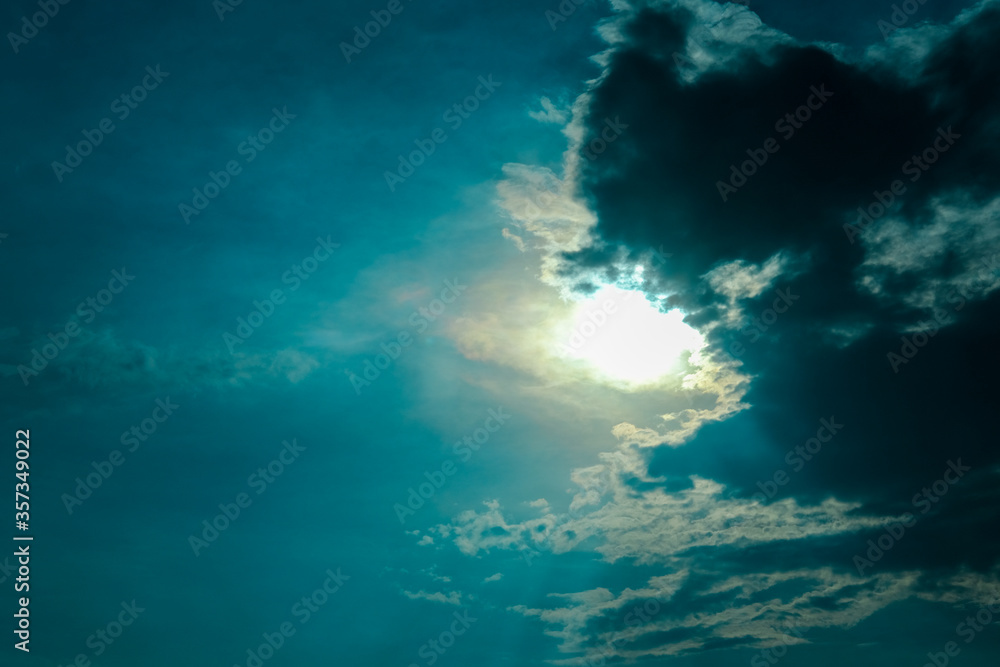 sun and sky with clouds