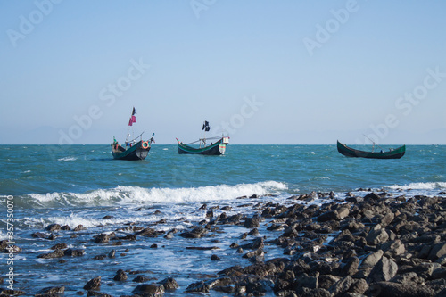 Tropical St. Martin beach with sand and Bay of Bengal travel tourism wide panorama background concept. The island locally known as Narkel Jinjira is the only coral island. Famous tourist place. 