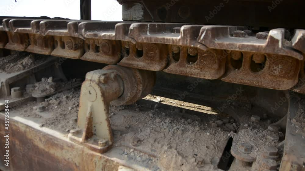 abandoned excavator. rusted parts in the sunset light. post-apocalyptic concept abandoned excavator. rusted parts in the sunset light. post-apocalyptic concept