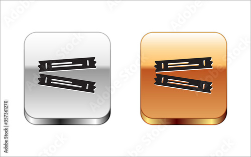 Black Sugar stick packets icon isolated on white background. Blank individual package for bulk food products as coffee, salt, spices. Silver-gold square button. Vector.