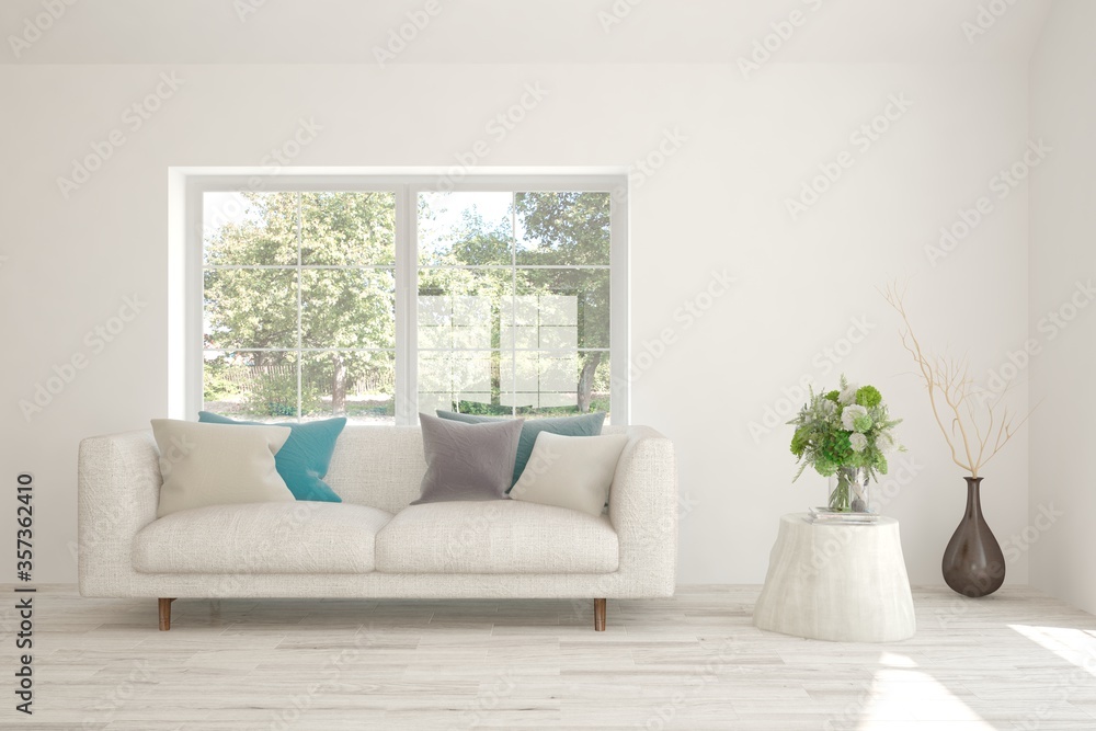 Fototapeta premium White living room with sofa and summer landscape in window. Scandinavian interior design. 3D illustration