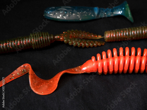 Rubber edible baits for fishing by spinning on a predator photo
